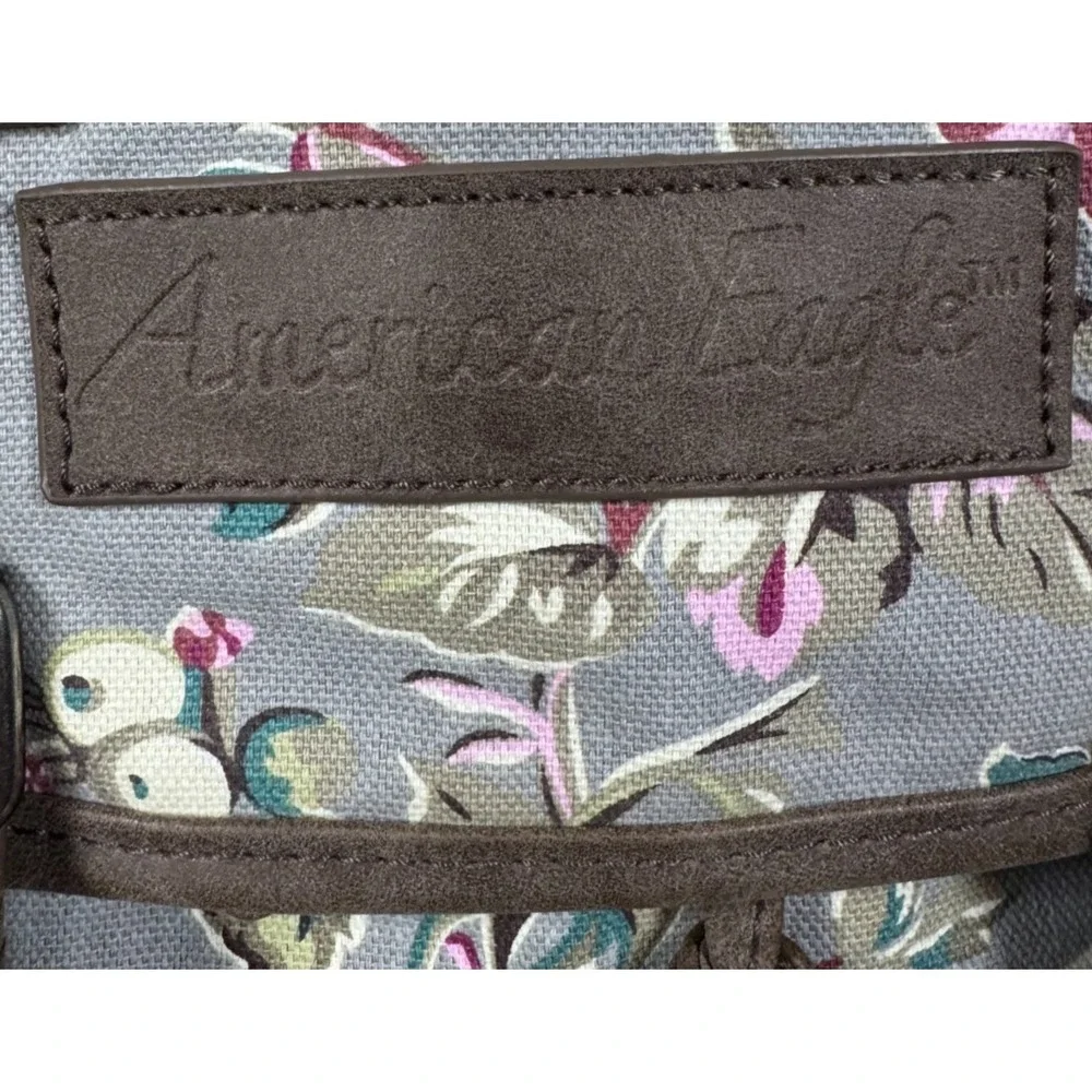 American Eagle Floral Canvas Drawstring Rucksack Backpack Gray Pink OS 169956
